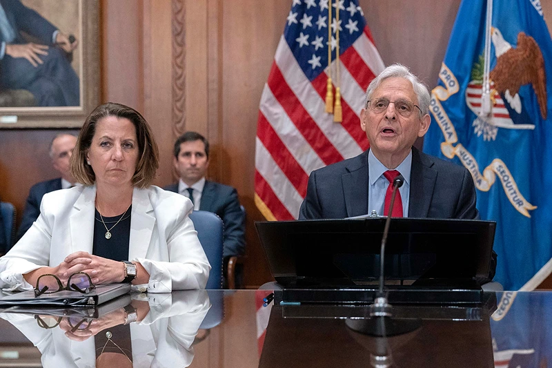 Pandemic Aid Great Grift Justice Department
FILE - Attorney General Merrick Garland accompanied by Deputy Attorney General Lisa Monaco speaks during a meeting at Department of Justice in Washington, June 14, 2023. Hundreds of people have been charged with the theft of more than $830 million in COVID-19 emergency aid following a nationwide operation conducted by federal, state and local law enforcement agencies, the U.S. Justice Department announced Wednesday. (AP Photo/Jose Luis Magana, File)
