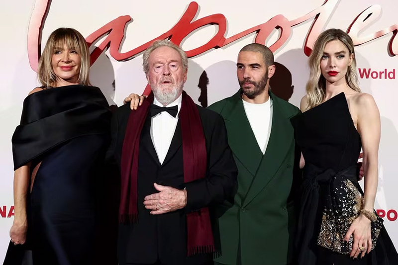 Director Ridley Scott, his wife, producer Giannina Facio, and cast members Tahar Rahim and Vanessa Kirby pose during a photocall for the World Premiere of the film "Napoleon" at the Salle Pleyel in Paris, France, November 14, 2023. REUTERS/Stephanie Lecocq