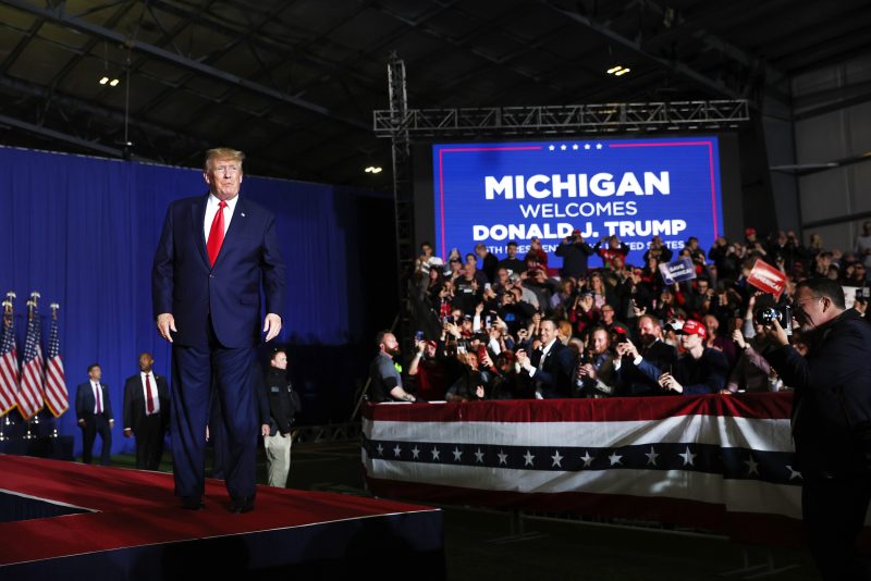 WASHINGTON, MICHIGAN - APRIL 02: Former President Donald Trump arrives at a rally on April 02, 2022 near Washington, Michigan. Trump is in Michigan to promote his America First agenda and voice his support for several Michigan Republican candidates. (Photo by Scott Olson/Getty Images)